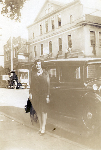 A young woman and a car