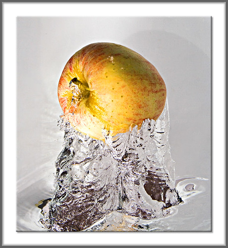 Apple Jumping Out Of The Water