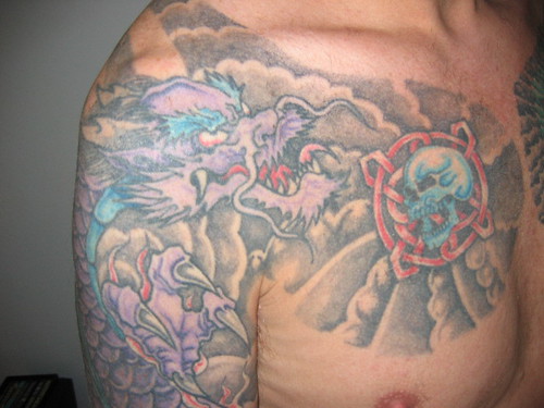 dragon and smoke tattoo