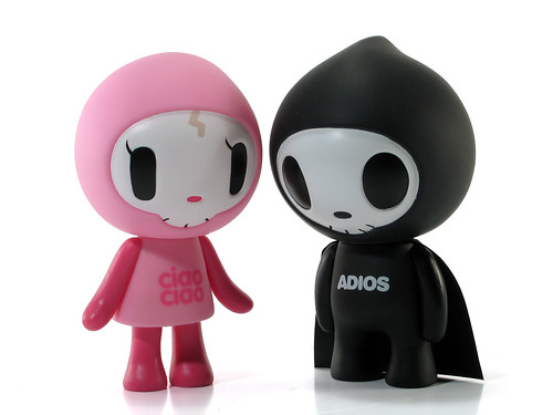 Adios & Ciao Ciao vinyl figures. Adios spent 500 years in fire and brimstone before the devil discovered his good-natured ways and kicked him out of hell.