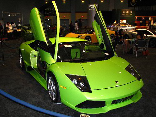 This is an awesome lime green Lamborghini There were 100's of new cars at