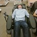 Pat Lee being tortured in a massage chair