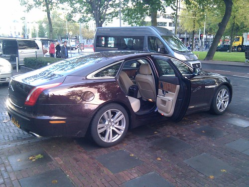Driving from the Bilderberg Parkhotel to the Erasmus University. Nice Jaguar again ;)