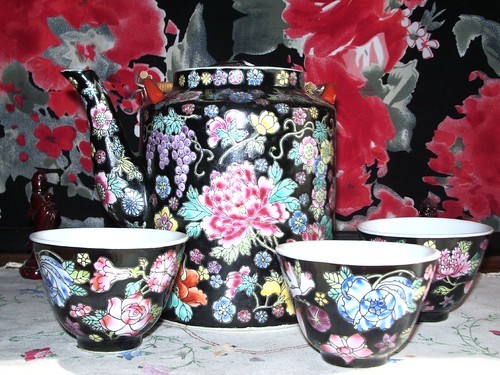TEA SET WITH FLORAL BACKGROUND