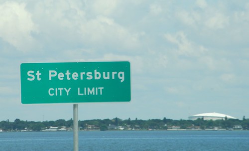 Distant picture of the Trop with a city limits sign for St. Pete