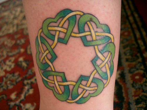 Celtic heart tattoo on left ankle. "Six hearts each represent a member of my 