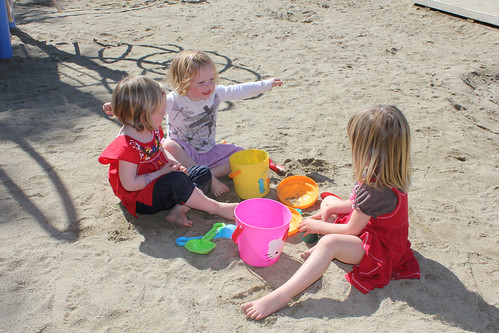 dottie and friends playing in the sand