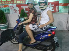 Becka and Rina on a moped