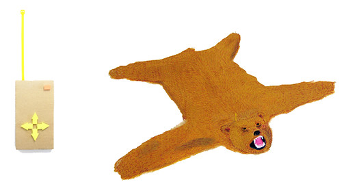 remote controlled bear skin rug and remote (collaged)