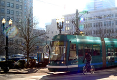 Streetcar and Bike, 10th and Washington,Portland