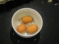 three eggs in a bowl