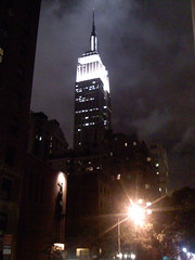 iPhone photo of the Empire State Building lit up at night, yo