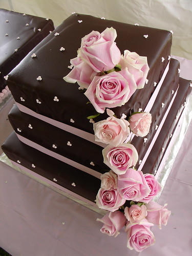 Decorated with pink ribbon fresh cascade pink roses Wedding cake pictures 