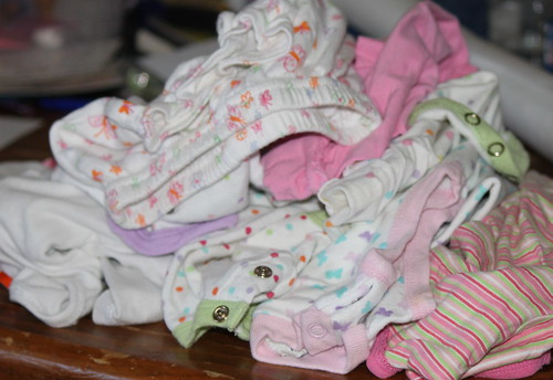 baby clothes waiting to be recycled