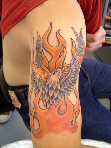 half sleeve Tattoo phoenix and flames