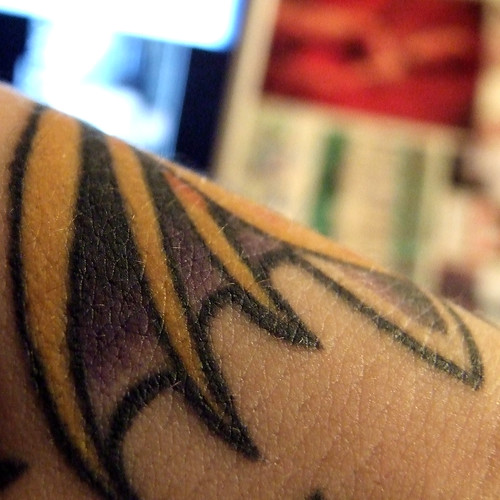 The "fin" on my evil-looking laser pistol tattoo.