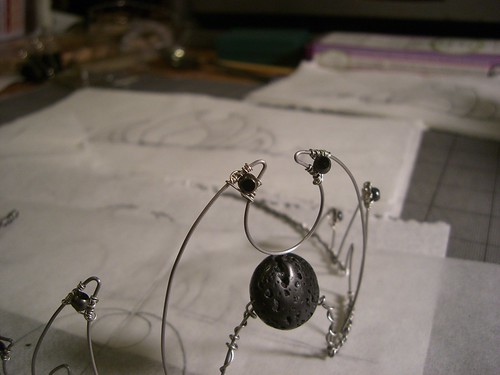 Closeup image of parts of the tiara, focusing on the small gauge wire and beads.