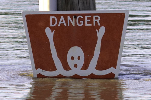 Sign - "Danger No Swimming", at riverfront, in Washington, Missouri, USA