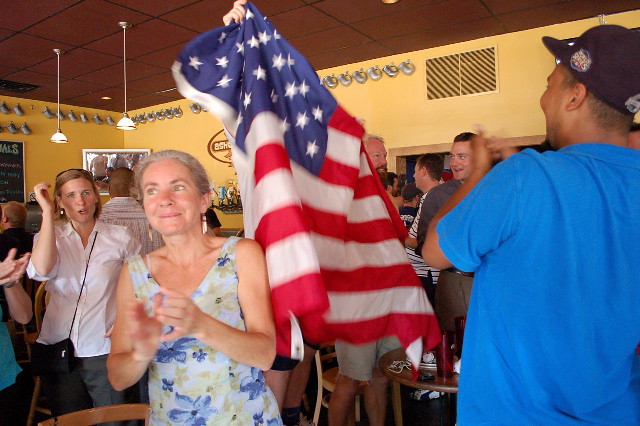 Local soccer fans celebrate the U.S. win over Algeria at the Asheville Pizza Company
