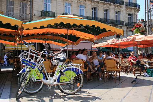 Vélomagg bikes from the local public cycle hire scheme take a breather outside a Montpellier café. Photo: Jean-Louis Zimmermann