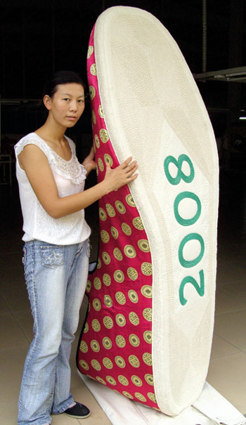 Huge hand-made shoe bearing the mascots of the Beijing Olympic Games