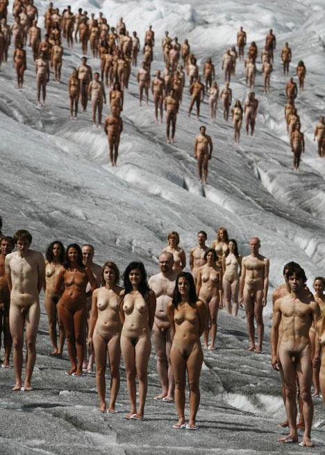 The volunteers are stripped naked against a background of ice and snow