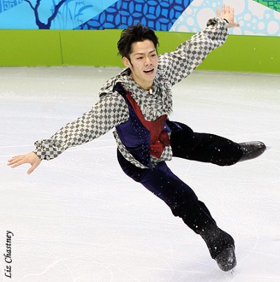 Daisuke Takahashi landing a jump at the 2010 Olympics. (Photo by Liz Chastney)