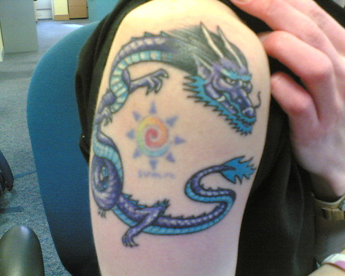 To learn how to get a dragon tattoo design that will stop traffic read 