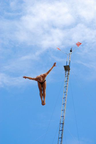 High diving with the same pose of the pole