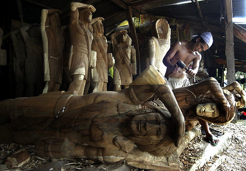 working woodcarving ifugao man shop rural alone solo lone handicraft philippines ifugao filipino pinoy pugo