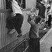 76a Hanoi residents carrying belongings and children climbing into train to flee south after Communist takeover 1954 by manhhai