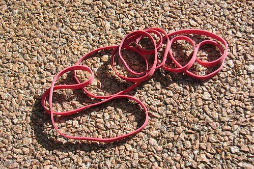 Kirsty Hall, photograph of red rubber bands