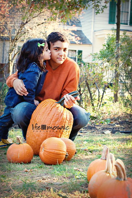 Kids Kiss Pumpkins