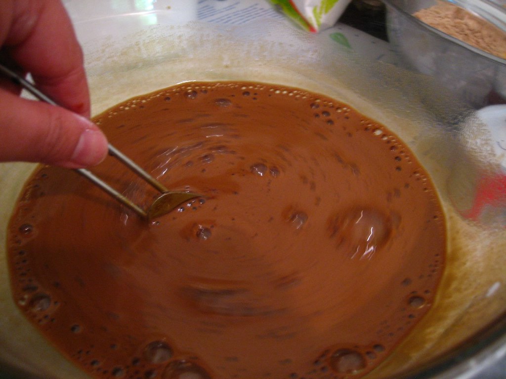 stirring together the coffee, baking powder, and molasses