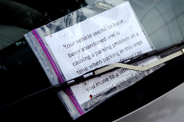 Someone left their car too long. Someone else left a note.