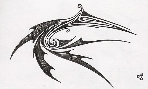 Artistic Tribal Tattoo Design for Back Tattooing Placement 