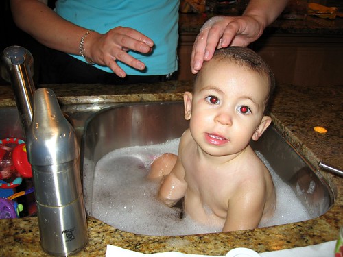takin' a bath in the sink...