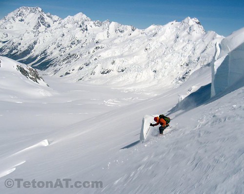 Andrew McLean skis the Upper Tasman Glacier with Mount Cook in the background