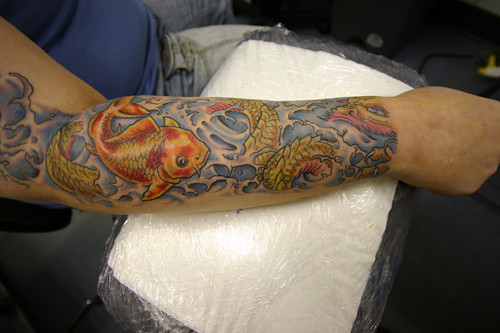 Pisces Designs Tattoo Colorful Koi on Sleeve