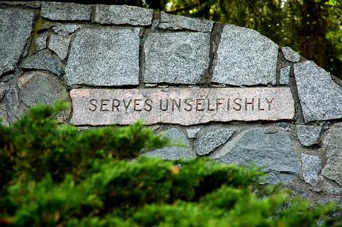 Serves Unselfishly, in stone, Seward Park, Seattle, Washington, USA by Wonderlane