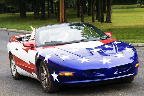 The US Flag in a car but with a little of design The stars and stripes are 