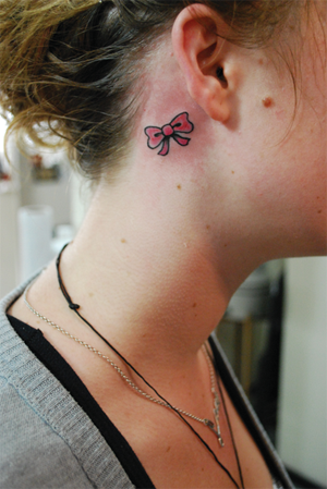Pretty n pink bow tattoo. go back