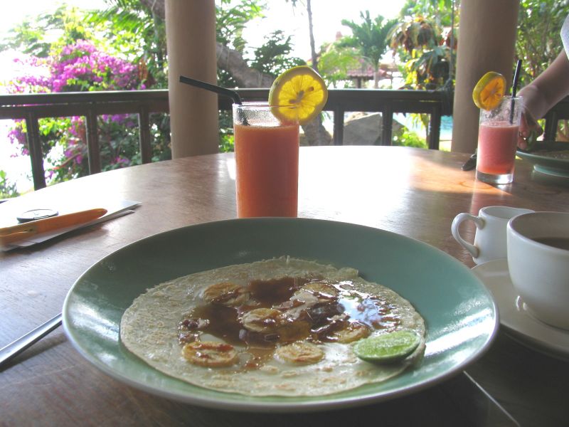 Banana pancake with palm sugar syrup and lime, and guava juice