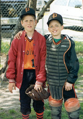Chad and I in little league. I was the pitcher, he was the catcher. What you can't see was our secret weapon: The red baseball spikes (yes, to go along with our orange and black uniforms!)
