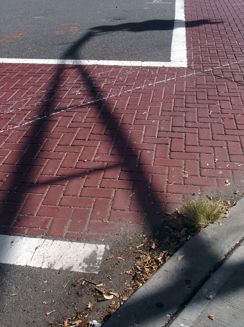 brick crosswalk and shadow