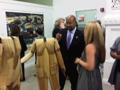 Mayor Nutter speaking with an artist at the opening reception for The Art Gallery At City Hall