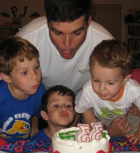 Patrick blows out his candles with P.J., Nick-Nick and Charlie
