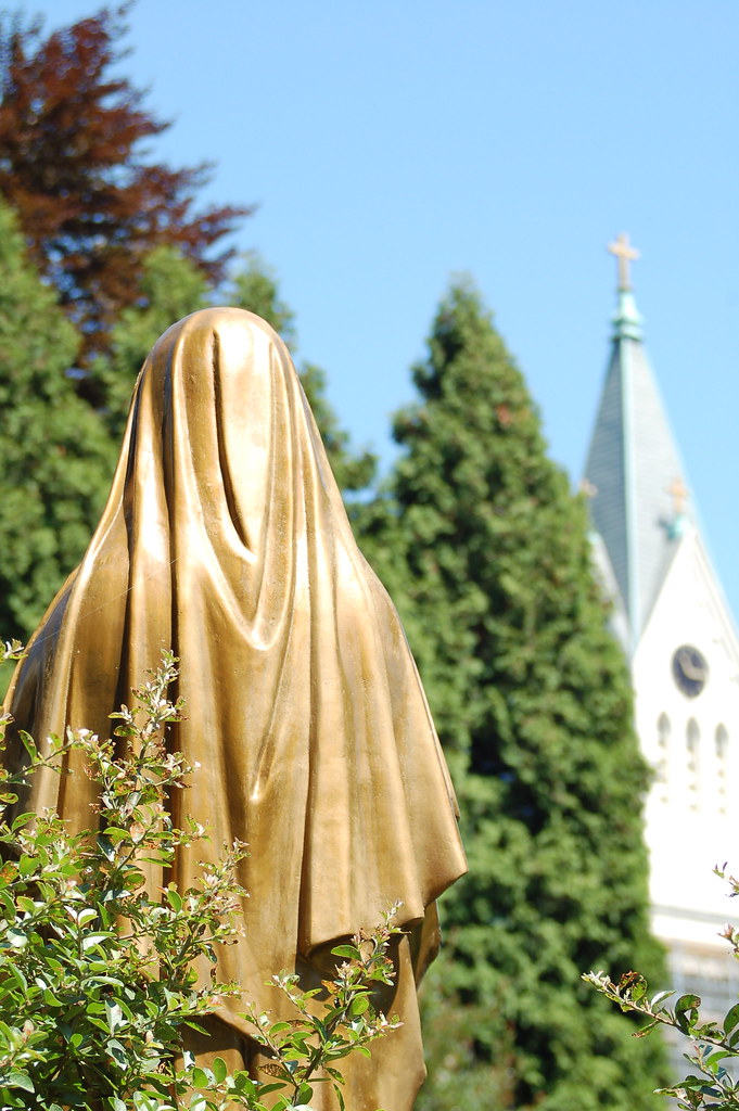 Rear view of nun statue