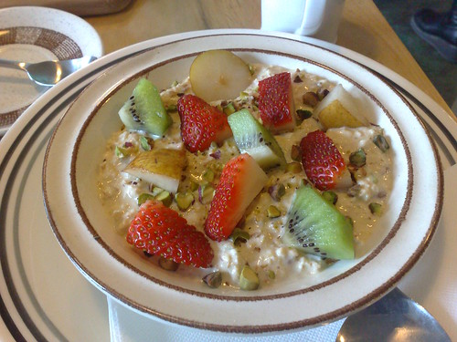 bircher muesli with pistachio, kiwi fruit & strawberries