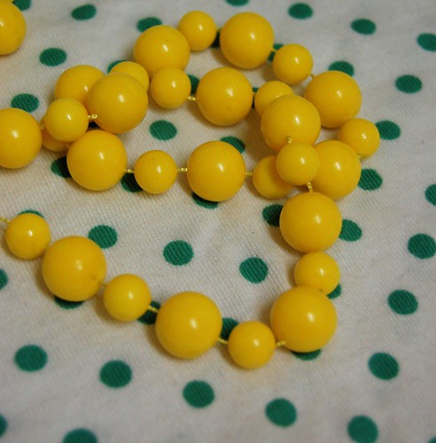 Thrifted yellow beads + polka t-shirt